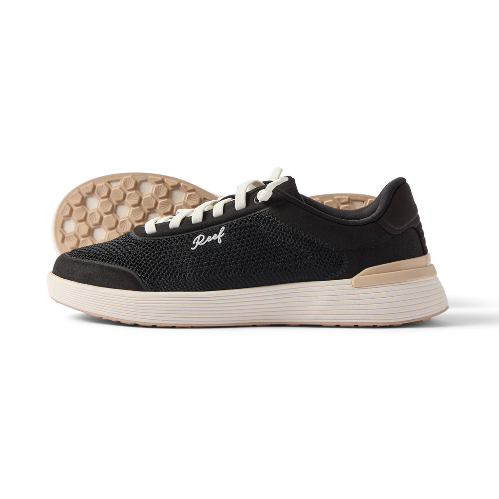 Side view of Shoreline Palisades black women's sneaker with anatomical arch support and soft cushioning outsole visible behind.