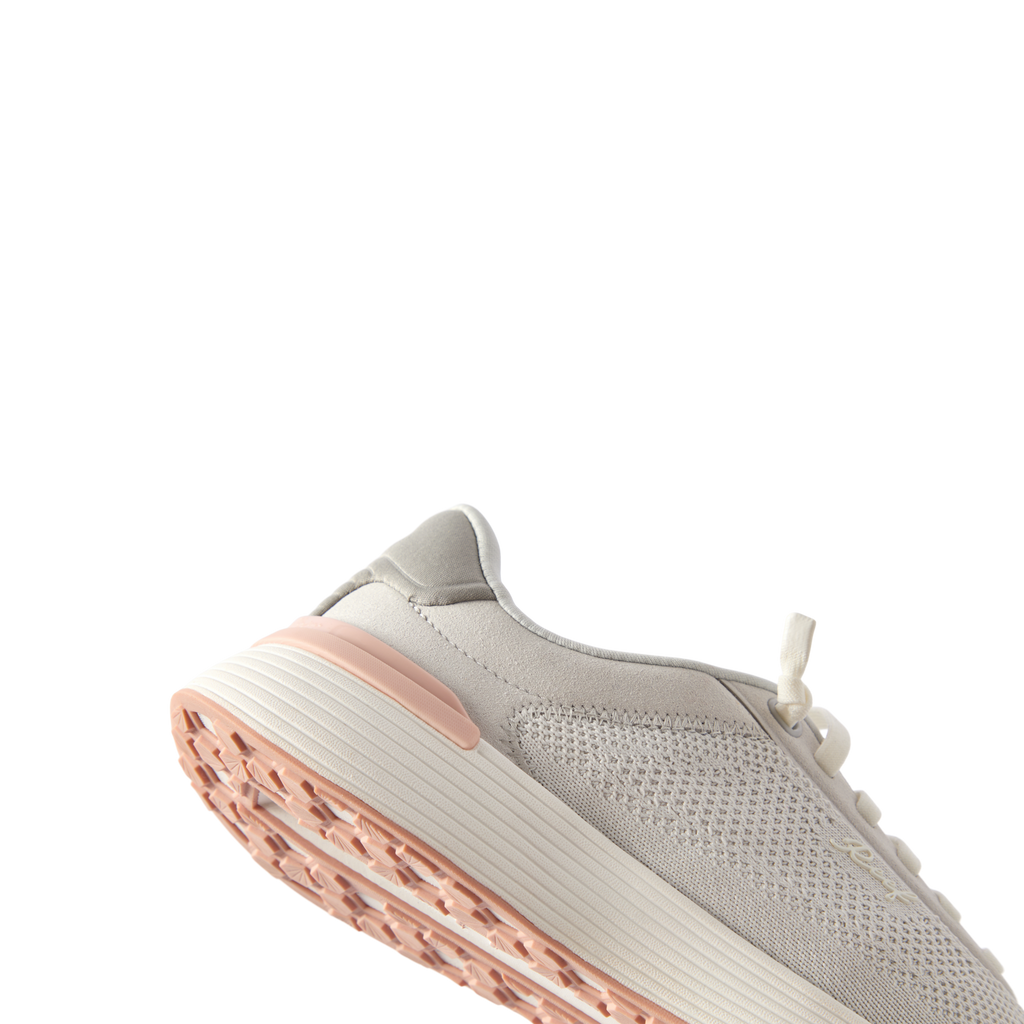 Shoreline Palisades women's sneaker facing left, close-up of midsole and heel with soft-rebound cushioning.
