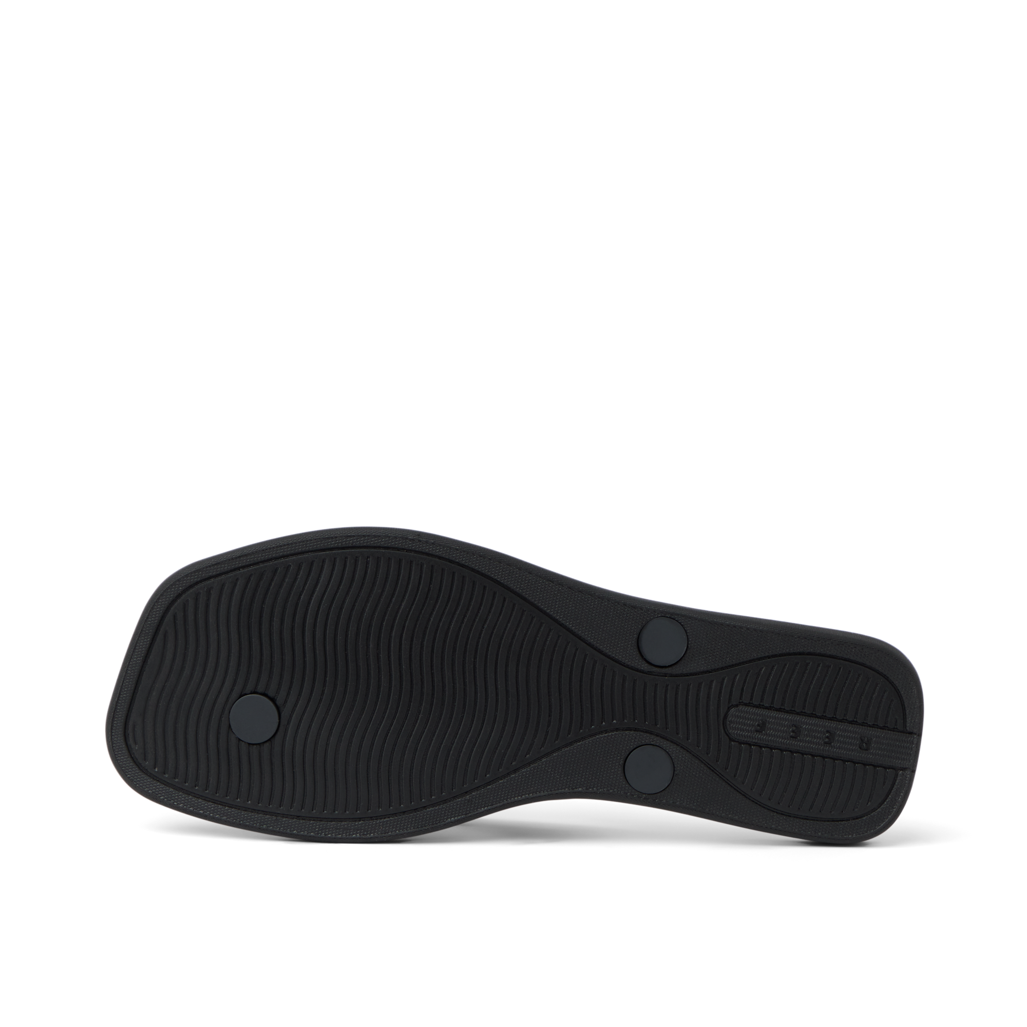 Solaye women's black sandal outsole facing up, showing textured water-friendly sole with REEF branding.