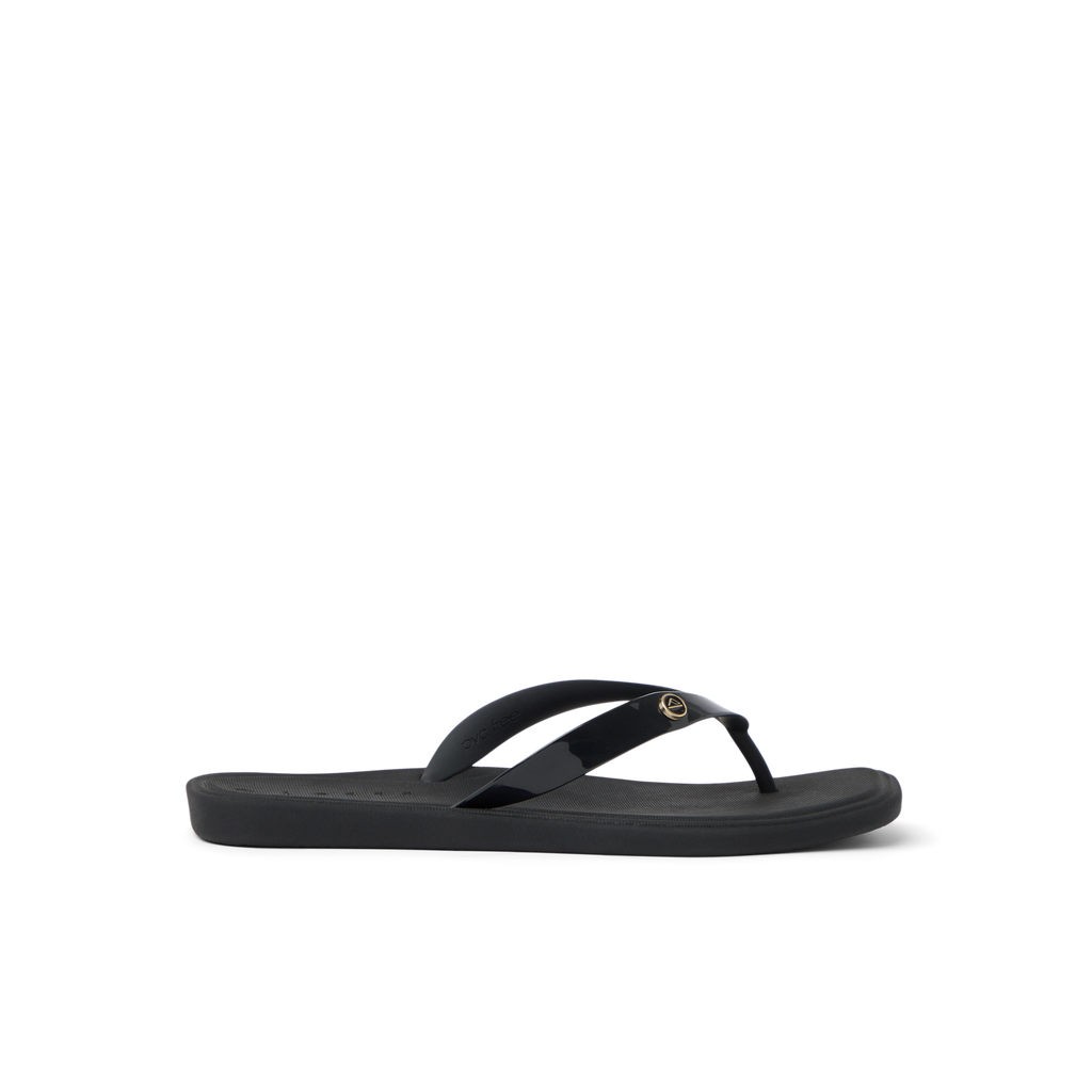 Solaye black women's flip flop sandal facing left with soft-rebound cushioning and anatomical arch support for comfort.