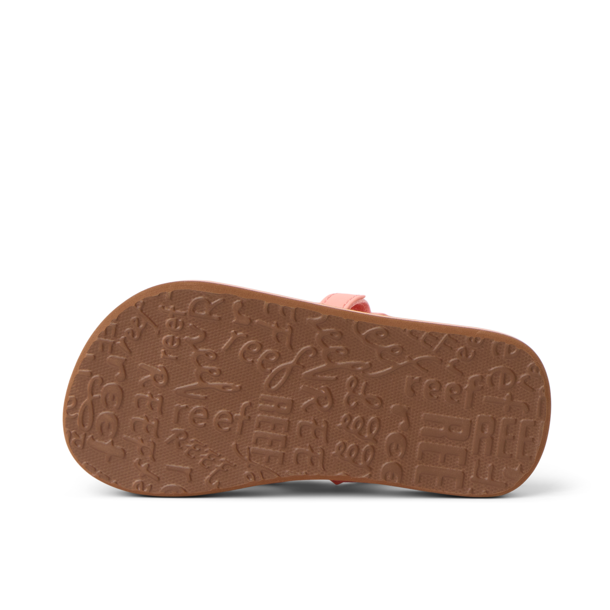 Little Ahi girls’ sandal sole facing up, showing textured outsole with Reef branding, comfort-focused and durable design.
