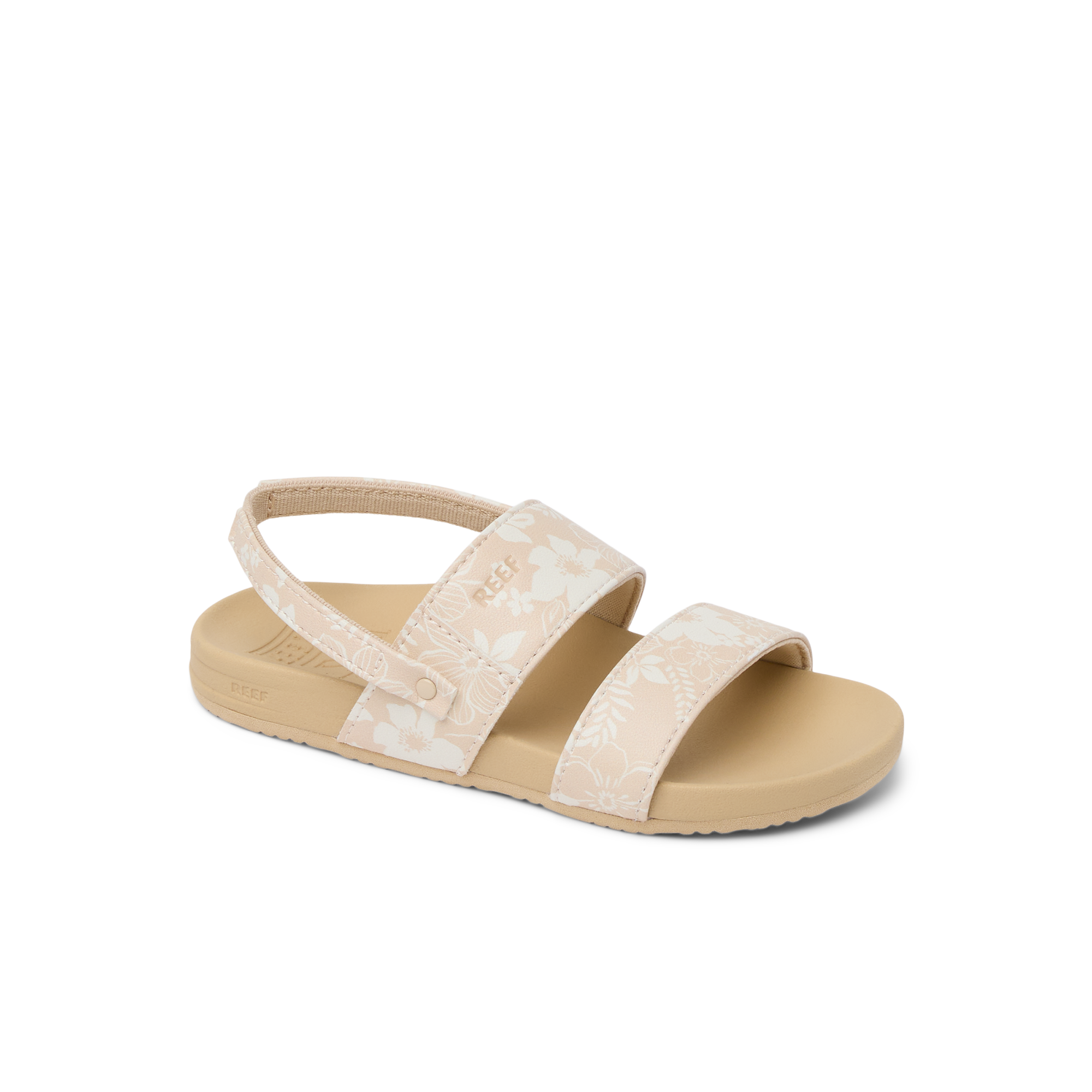 Little Cushion Vista girls sandal facing left, white floral straps, tan cushioned sole, surf-inspired comfort design.