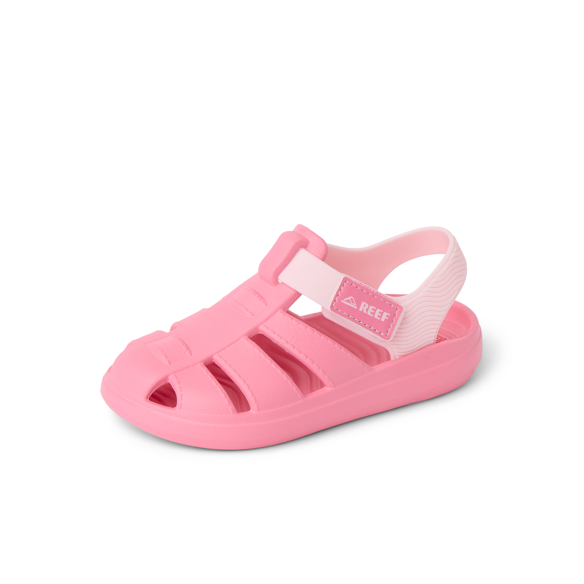 Little Totally Beachin pink girls’ sandal facing left with comfort cushioning and arch support, beach-inspired design.
