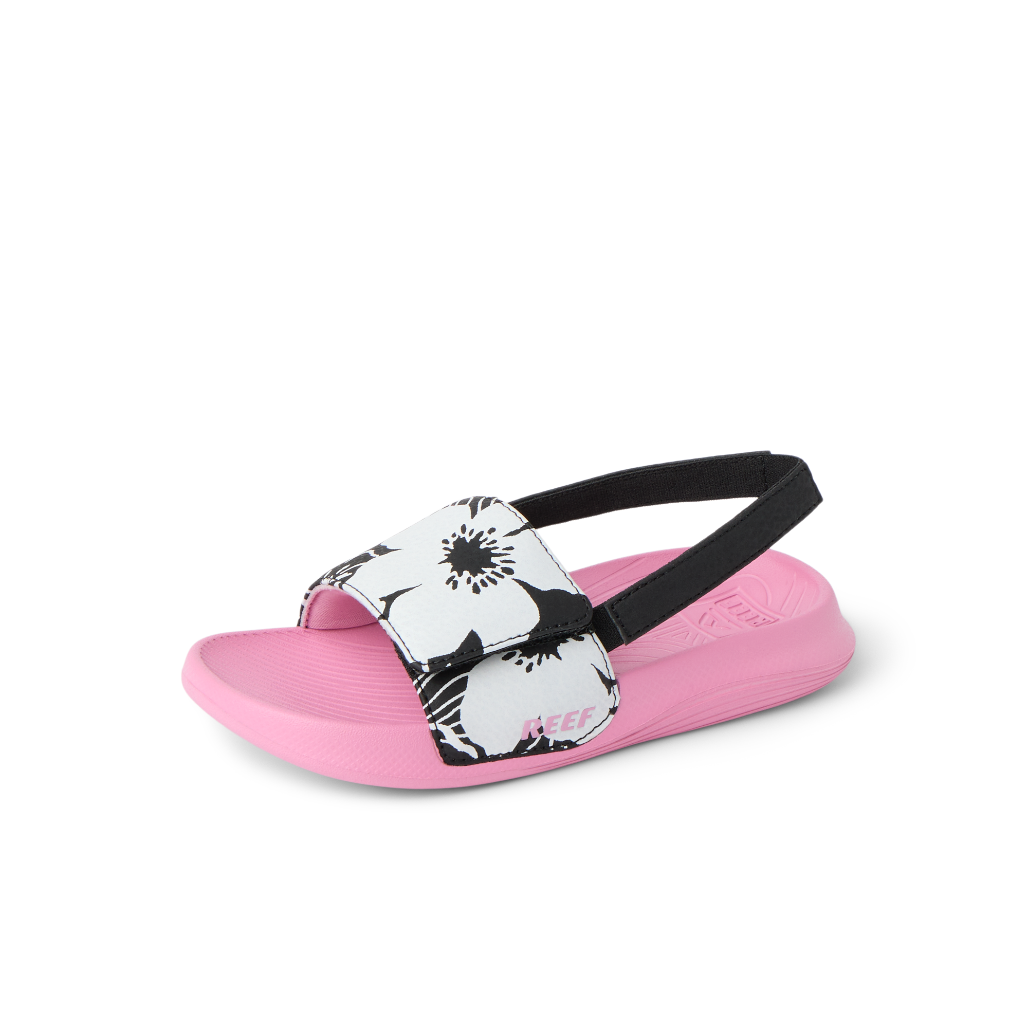Little Salty Slide sandal for girls facing left, showing soft pink sole, black and white floral strap, and black heel strap.
