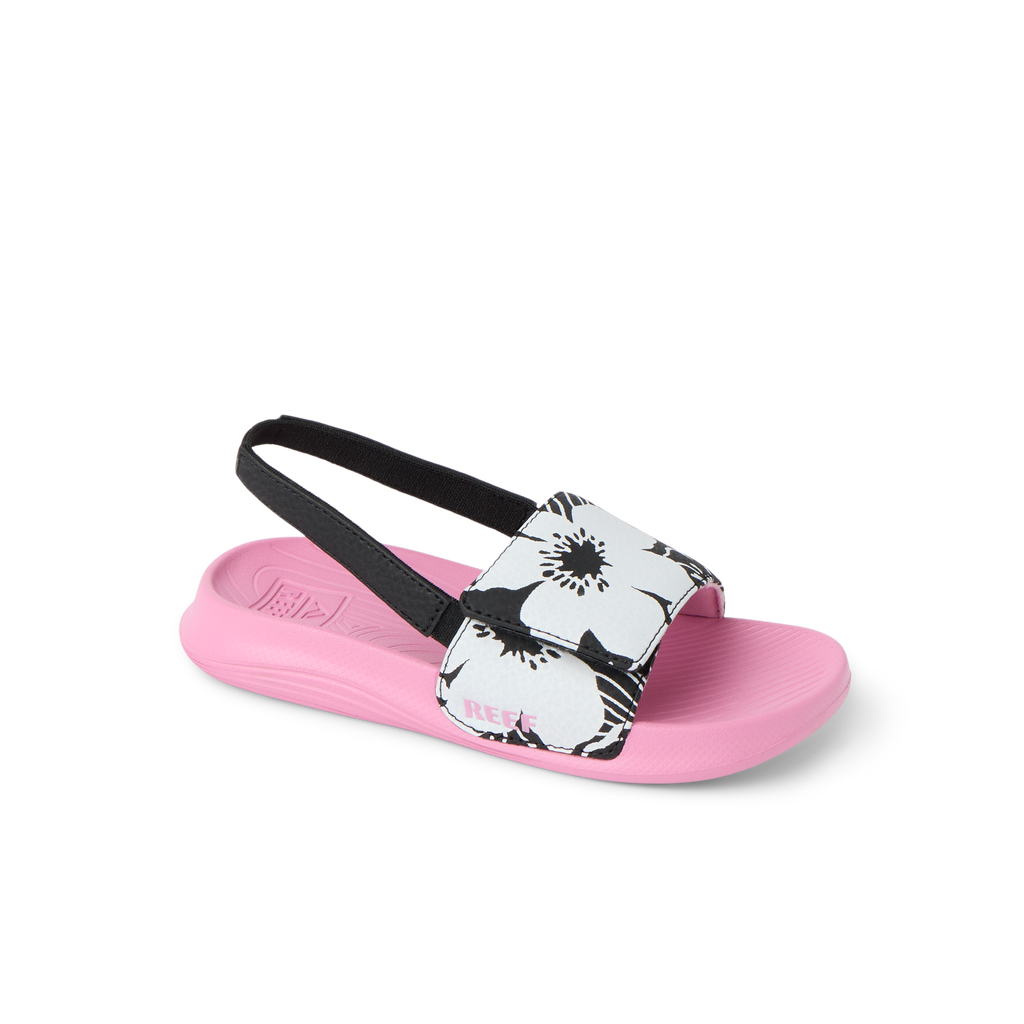 Little Salty Slide for girls facing right, showing top and side with floral strap, pink sole, and arch support.