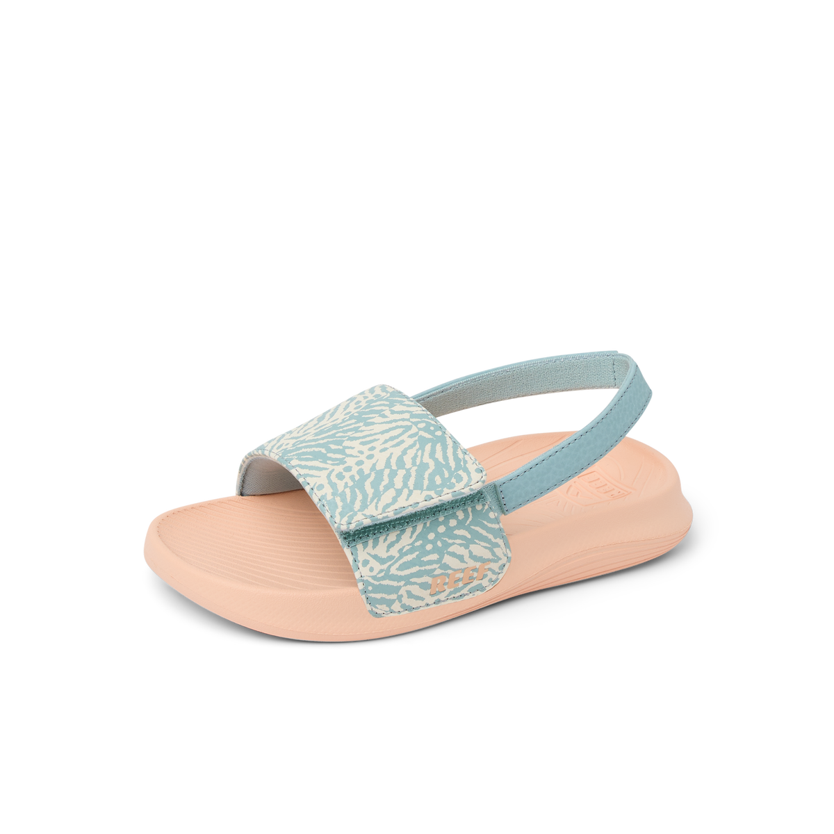 Little Salty Slide sandal for girls facing left, with blue haze strap and cushioned sole, beach-inspired comfort footwear.
