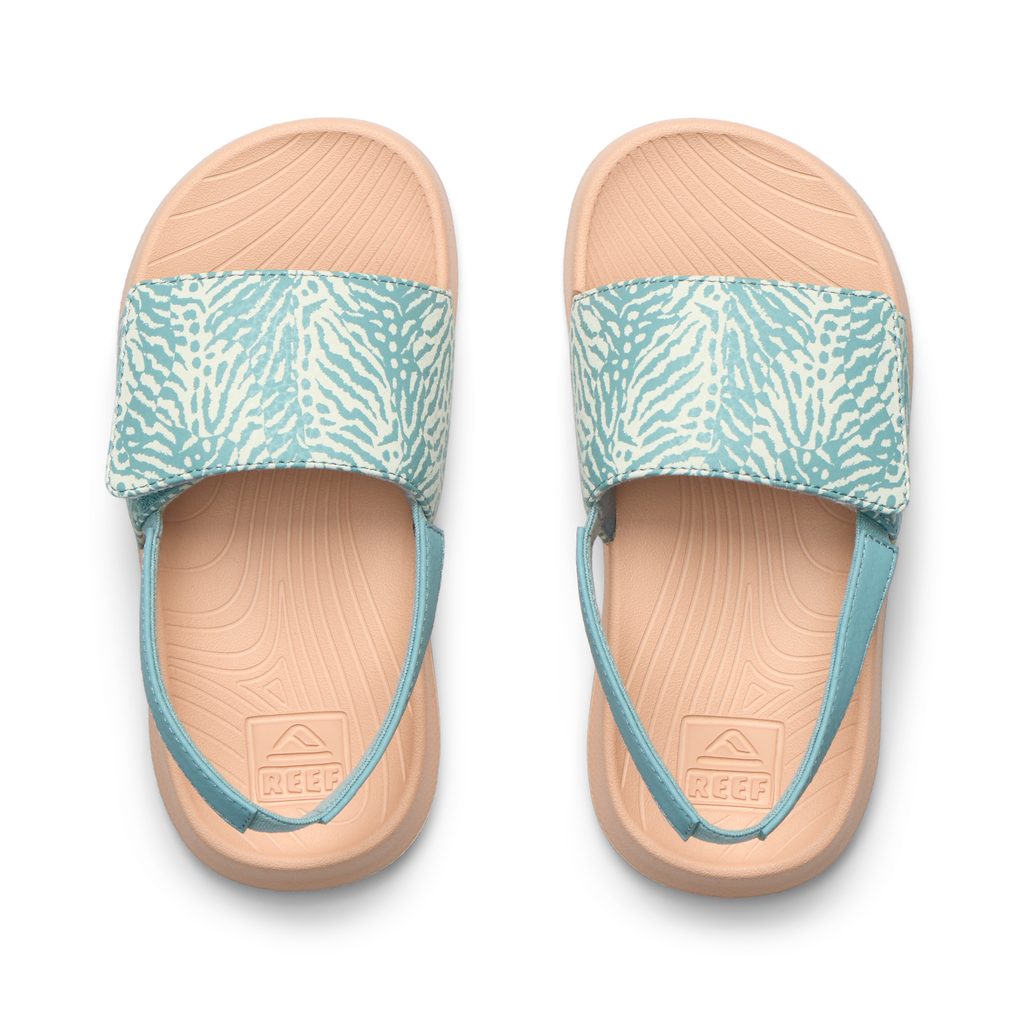 Little Salty Slide sandals for girls, top view facing up, featuring water-friendly, cushioned footbed and patterned straps.