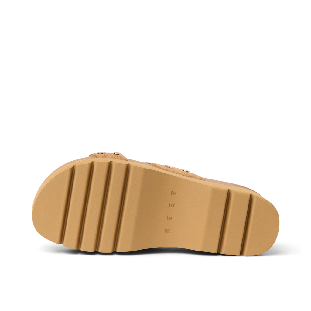 Vista Higher Cleo women's tan sole facing up, close-up of durable outsole with REEF branding, surf-inspired comfort design.