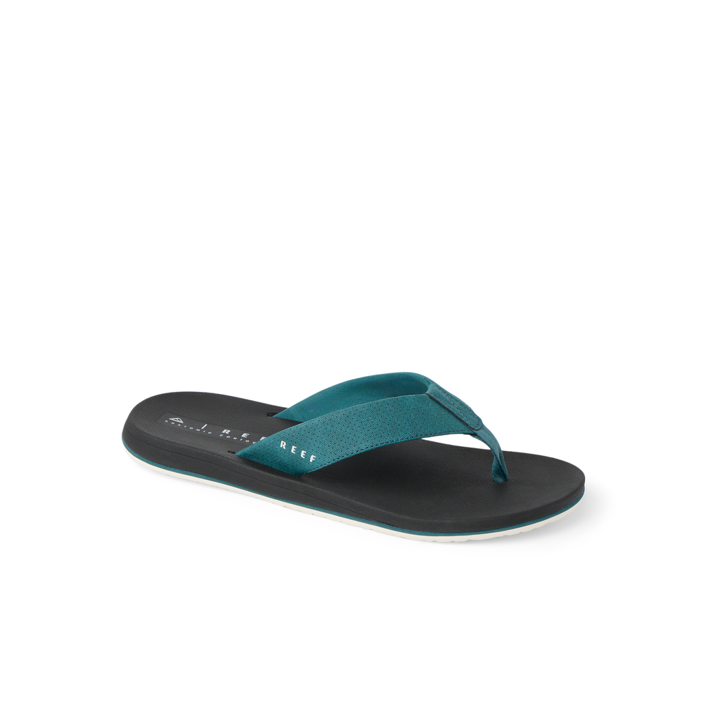 Nox men's sandal facing right, close-up of teal strap and black cushioned footbed with arch support and water-friendly design.