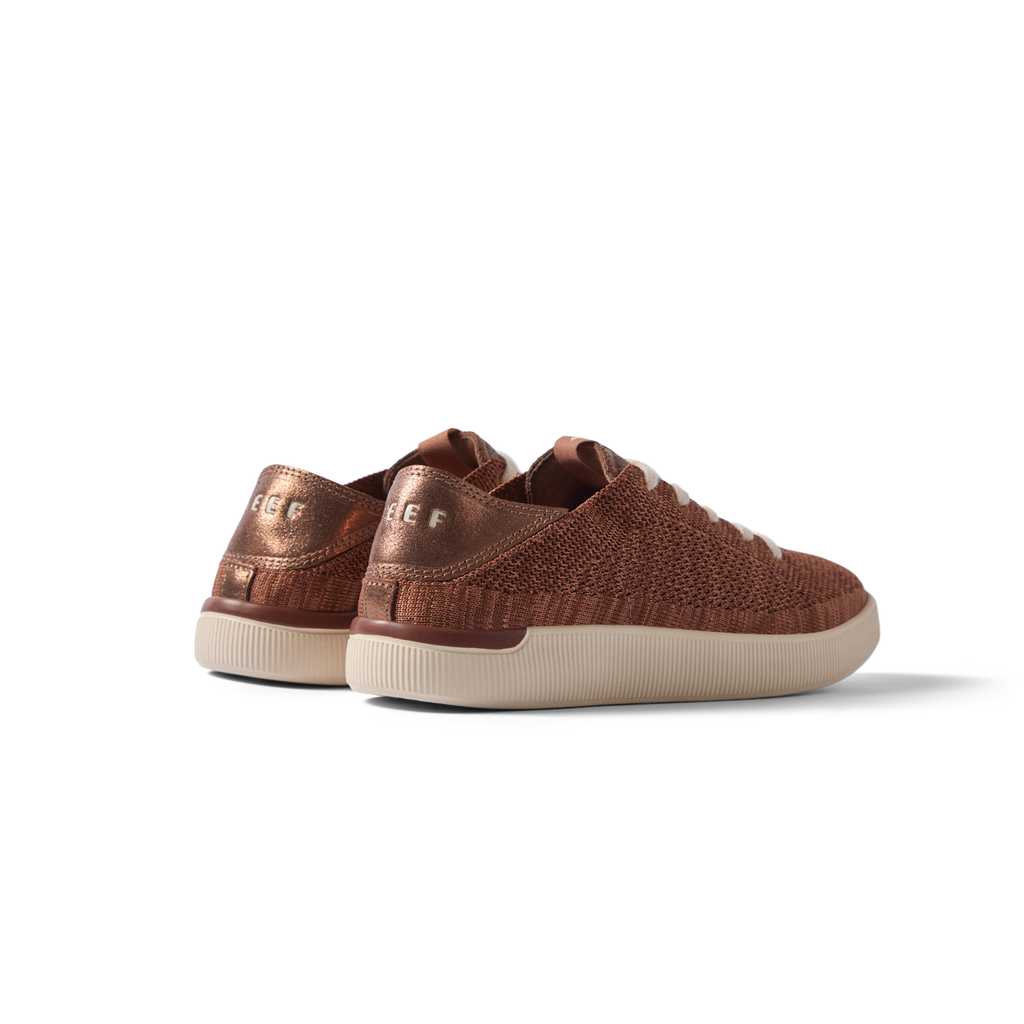 Reef Neptune women's right-facing sneaker rear view in metallic brown with soft-rebound cushioning and arch support