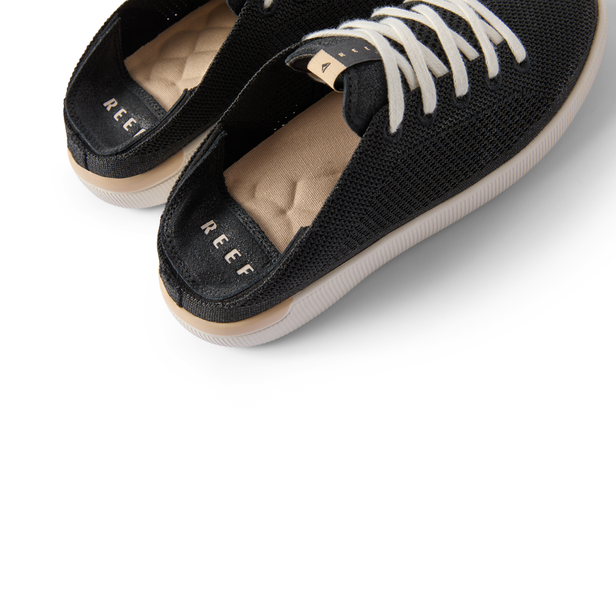 Reef Neptune women's black mesh sneakers shown from above, highlighting cushioned footbed and comfort features.