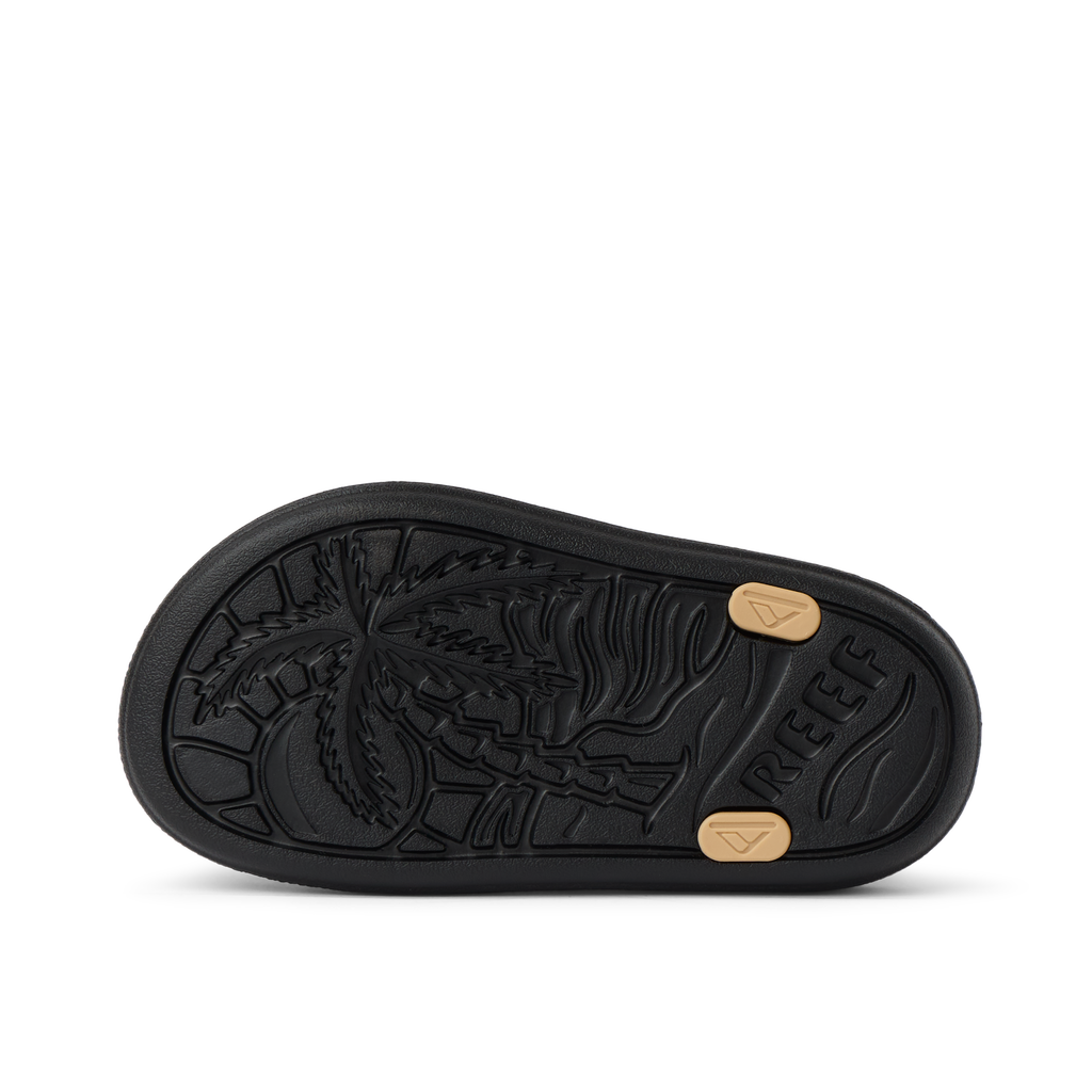 Little Totally Beachin sole facing up showing wave and palm tree design with durable, water-friendly comfort features