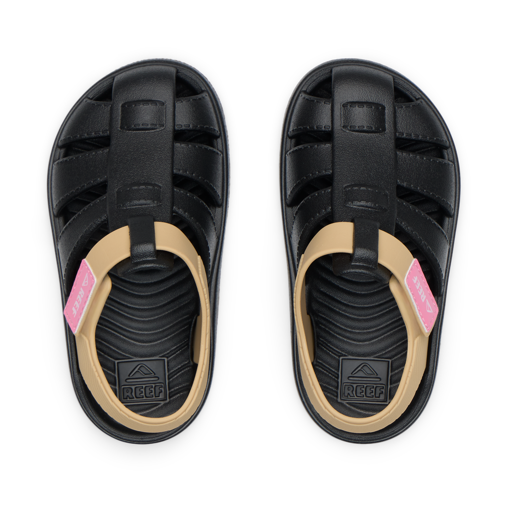Top view of Little Totally Beachin black and tan girls' sandals with anatomical arch support and soft cushioning.