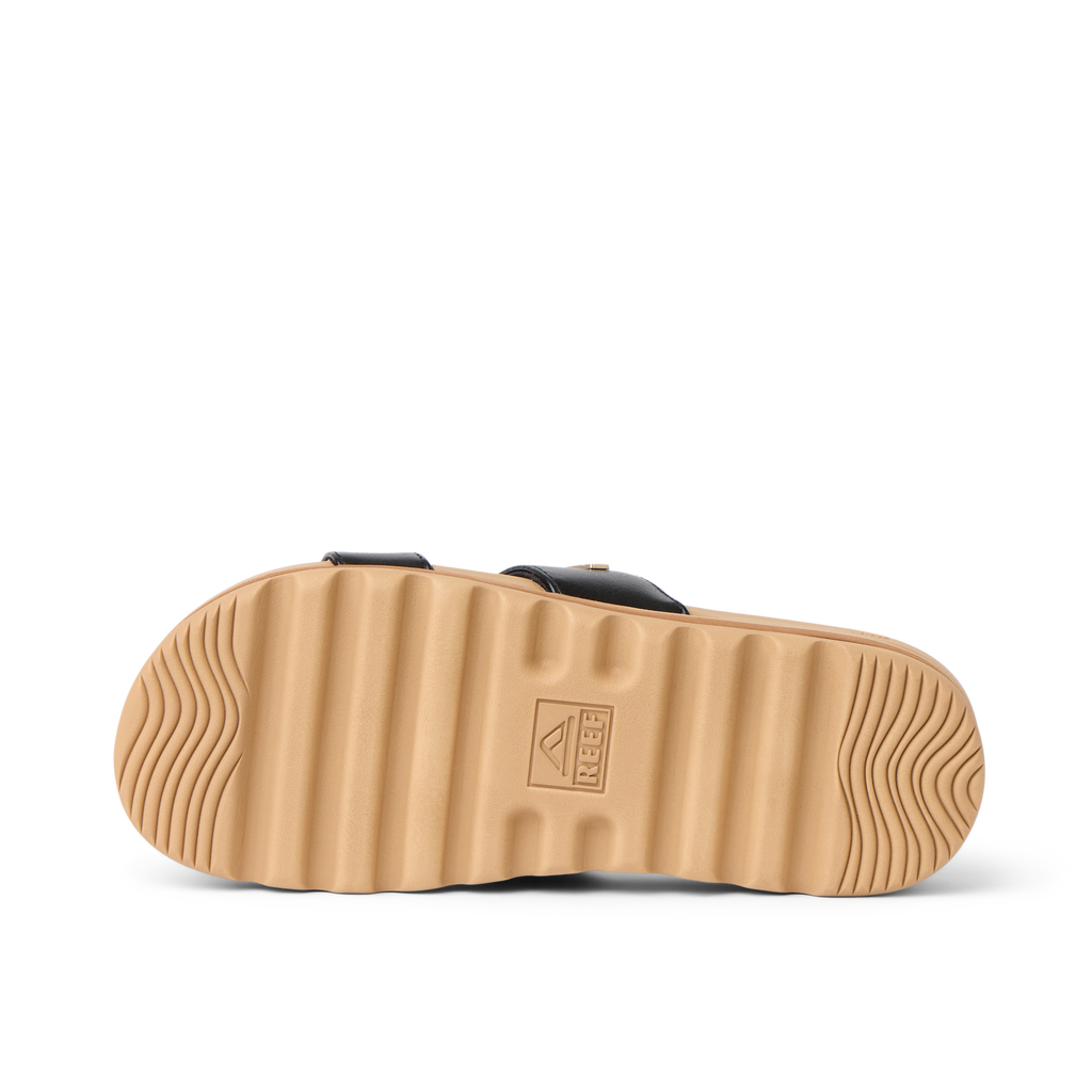 Kids Vista Hi sandal sole in tan with black straps, shown from the bottom, featuring durable, water-friendly comfort design.