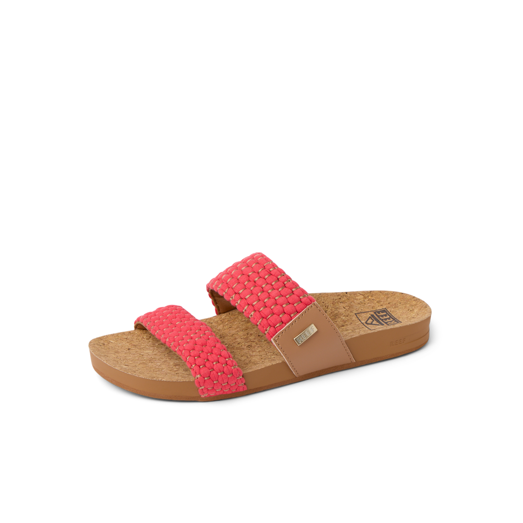 Cushion Vista women's slide sandal facing right with coral woven straps, cork footbed, and anatomical arch support for beach comfort