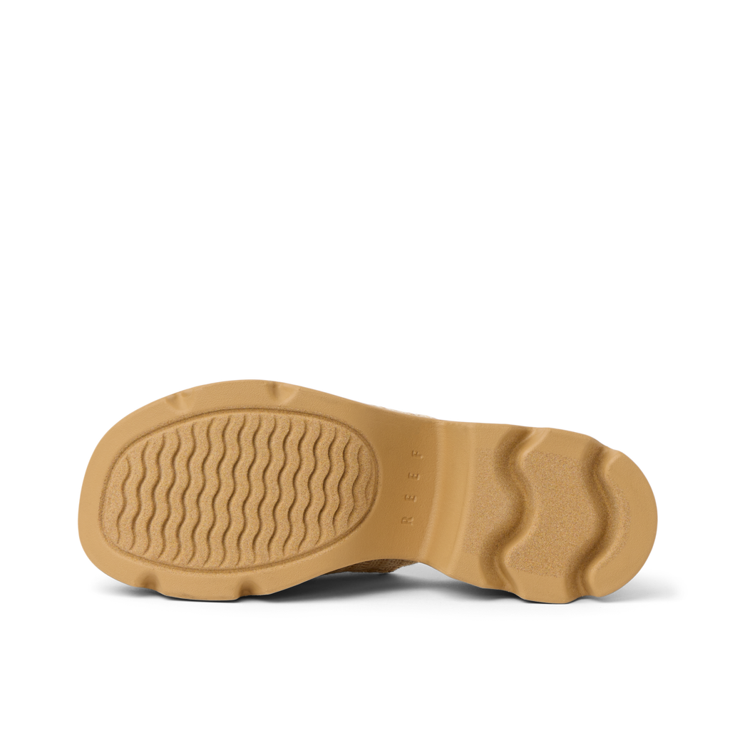 Vista Luxe Evie women's sandal showing the outsole facing up, highlighting durable, water-friendly traction pattern.