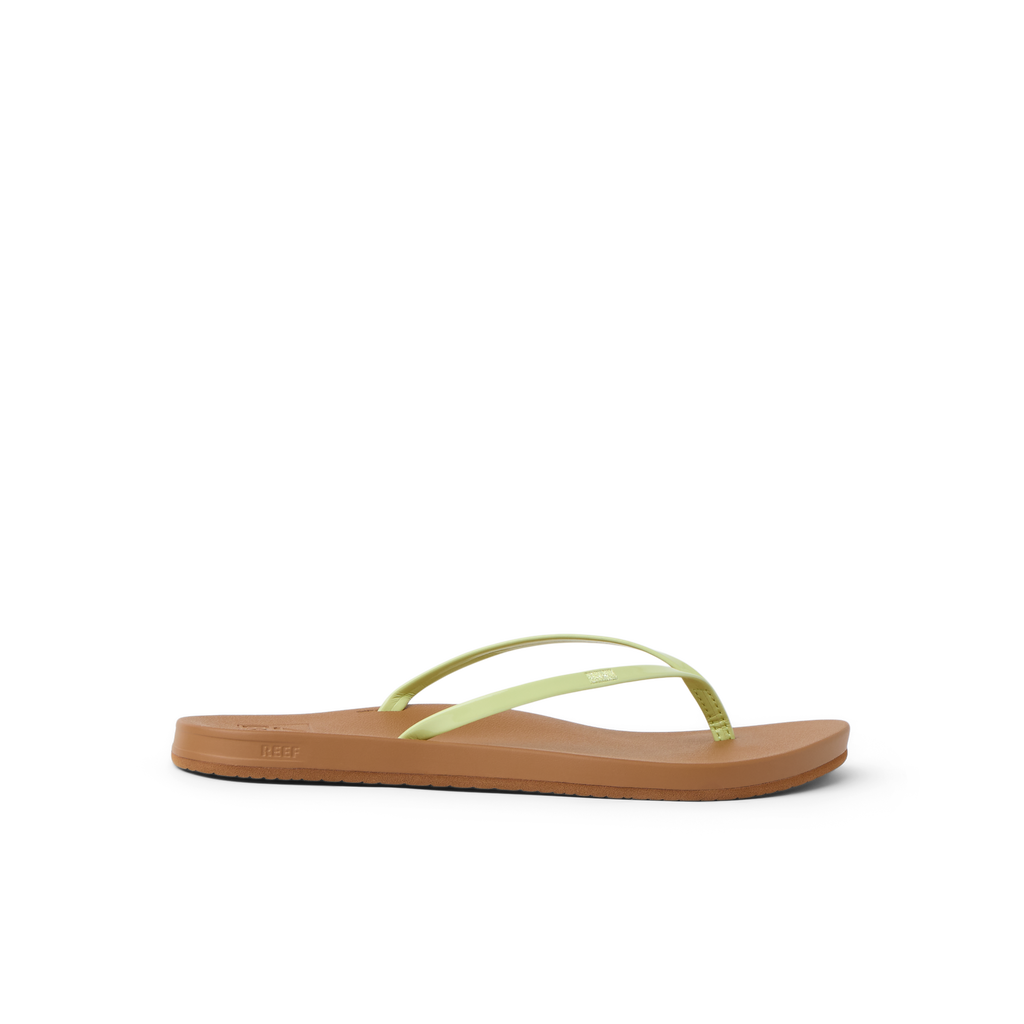 Cushion Slim women's flip flop facing right with lime sherbert straps and cushioned arch support for beach comfort