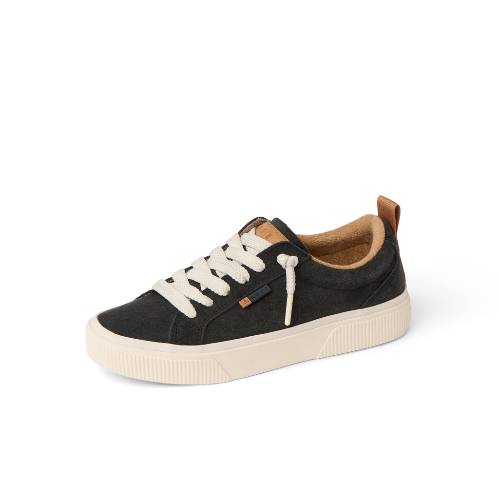 Right-facing Lay Day Dawn sneaker in charcoal with thick white sole and comfort cushioning for women adults