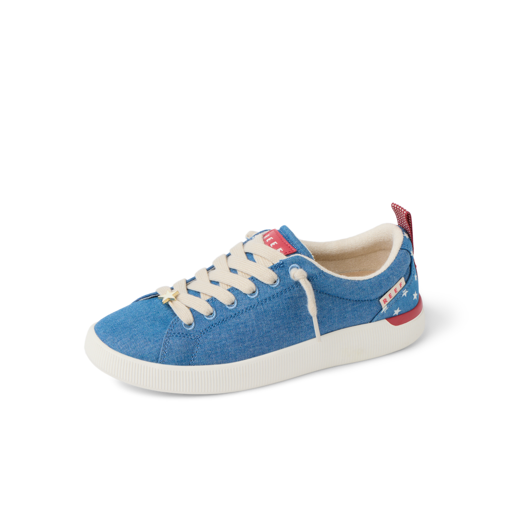 Neptune Alana women's sneaker facing left, blue with white sole, featuring arch support and soft cushioning for beach comfort.