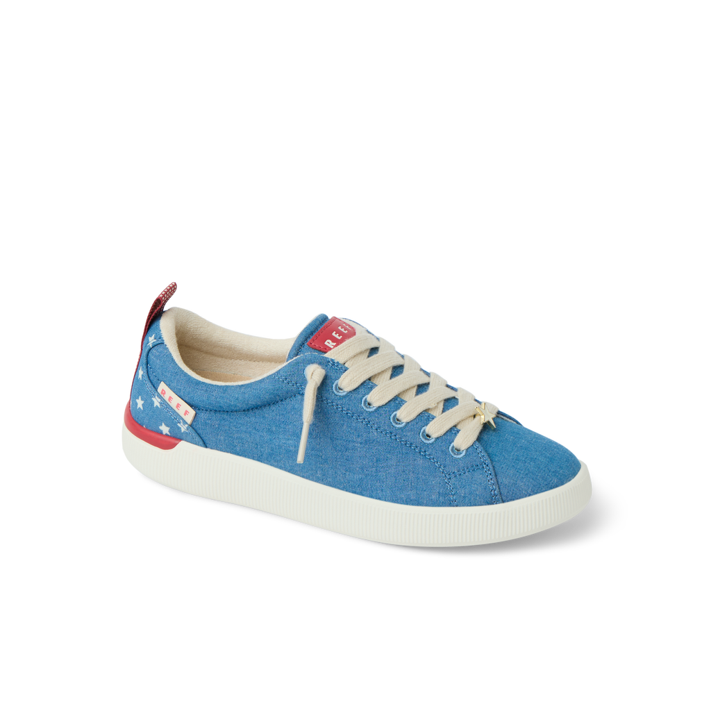 Neptune Alana women's blue sneaker facing right, featuring soft cushioning and arch support with star design accents.