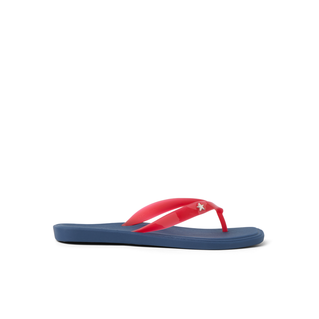 Solaye women's flip flop facing right with red straps and blue sole, surf-inspired comfort and arch support.