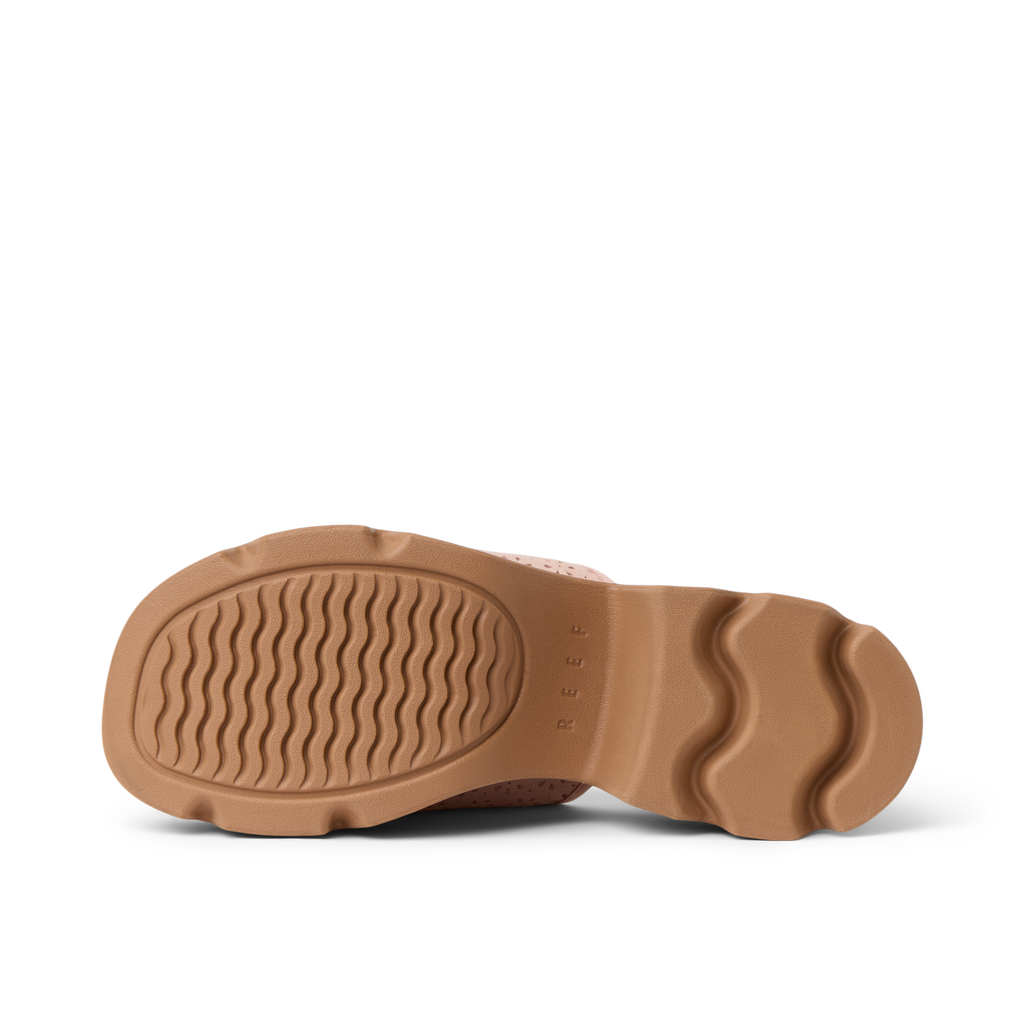 Vista Luxe Evie showing the sole facing up, featuring durable, water-friendly material with soft cushioning for all-day comfort.
