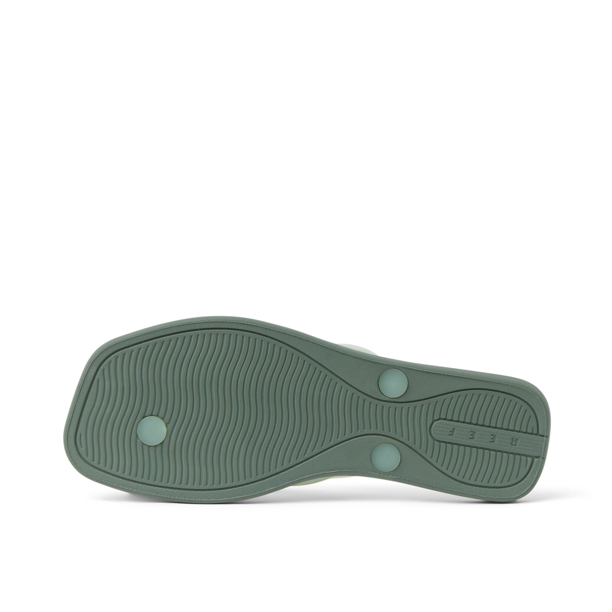 Solaye women's water-friendly sandal sole facing up, showing tread pattern and REEF logo, designed for beach comfort.