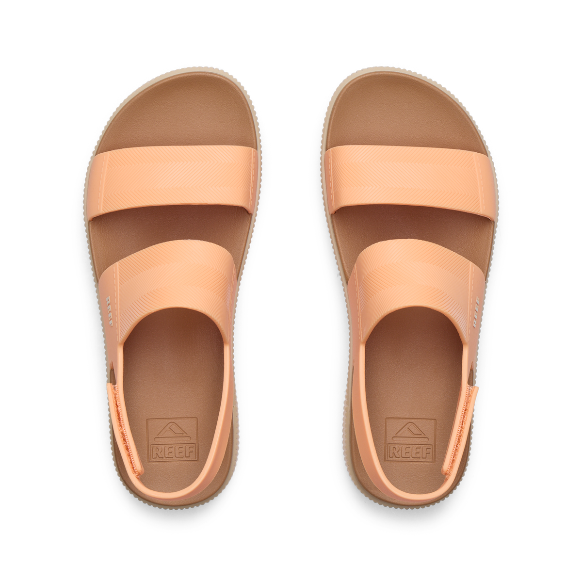 Top view of Water Vista Higher women's sandals in soft orange, showing straps and cushioned footbeds, designed for all-day comfort.