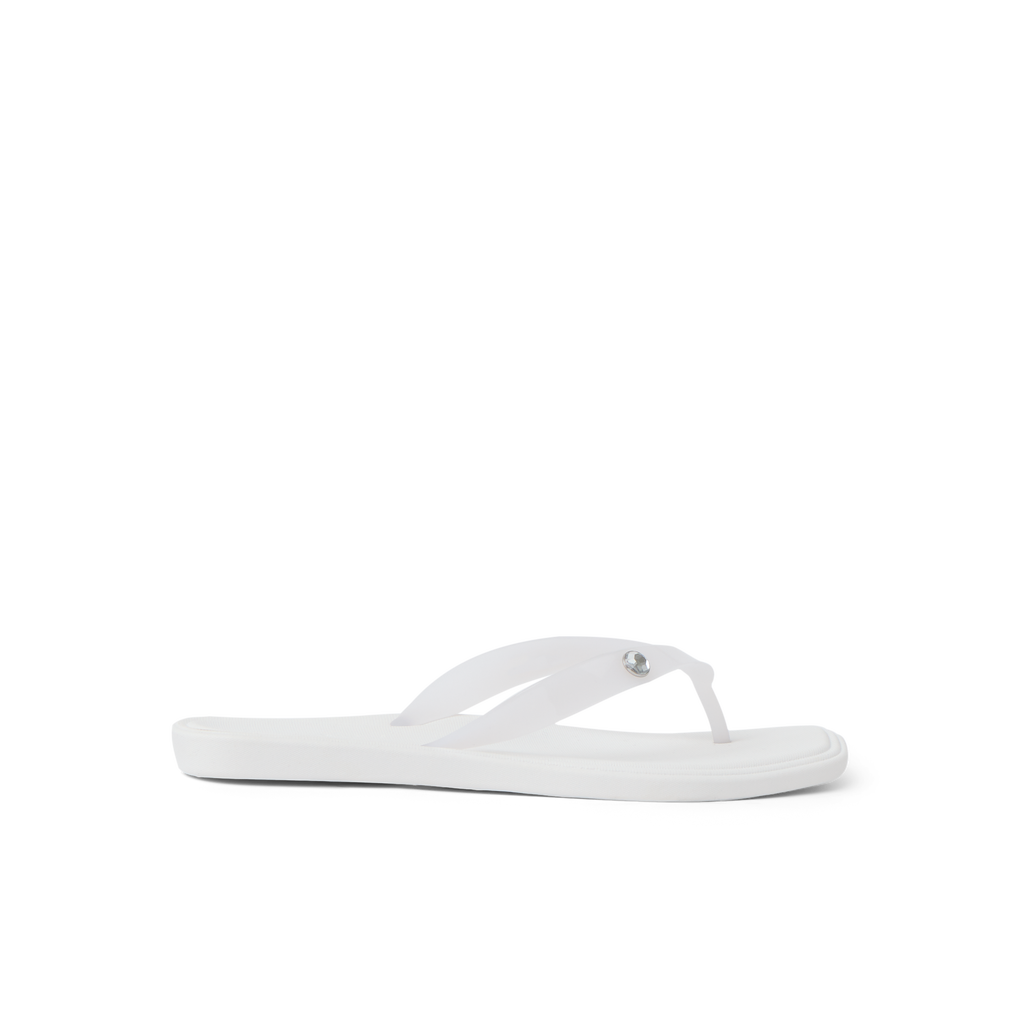 Solaye white women's flip flop sandal facing right with comfort cushioning and surf-inspired arch support