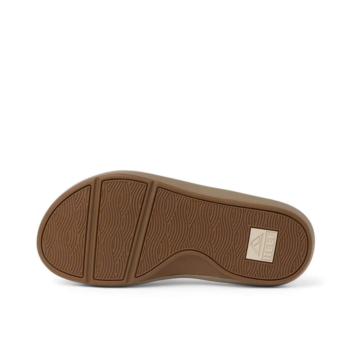 Cruiser men's shoe outsole facing upward showing wave-patterned tread with REEF logo, designed for beach comfort and durability.