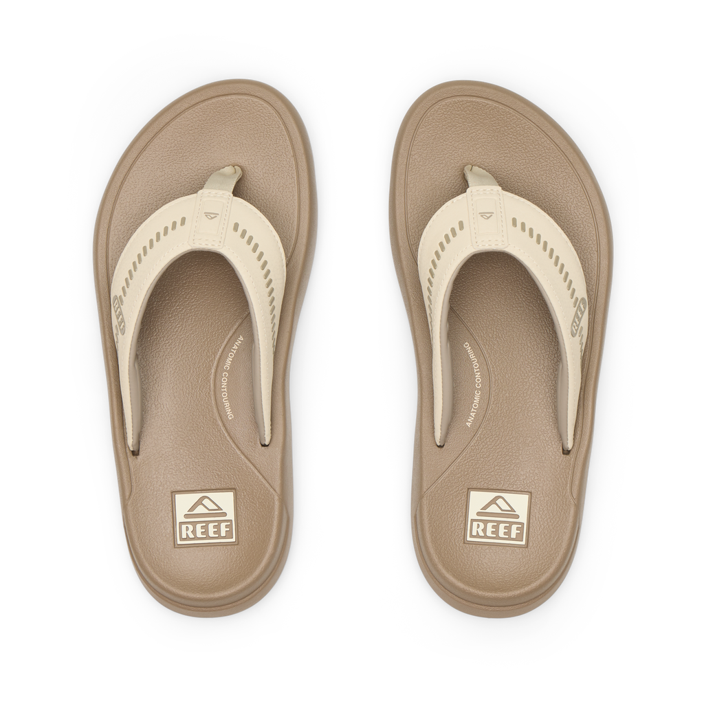 Top view of men’s Cruiser flip flops in oatmeal color with anatomical arch support and soft cushioning for beach comfort