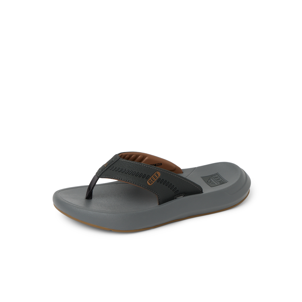 Cruiser men's sandal facing right, showing soft-rebound cushioned footbed and arch support in dark colors