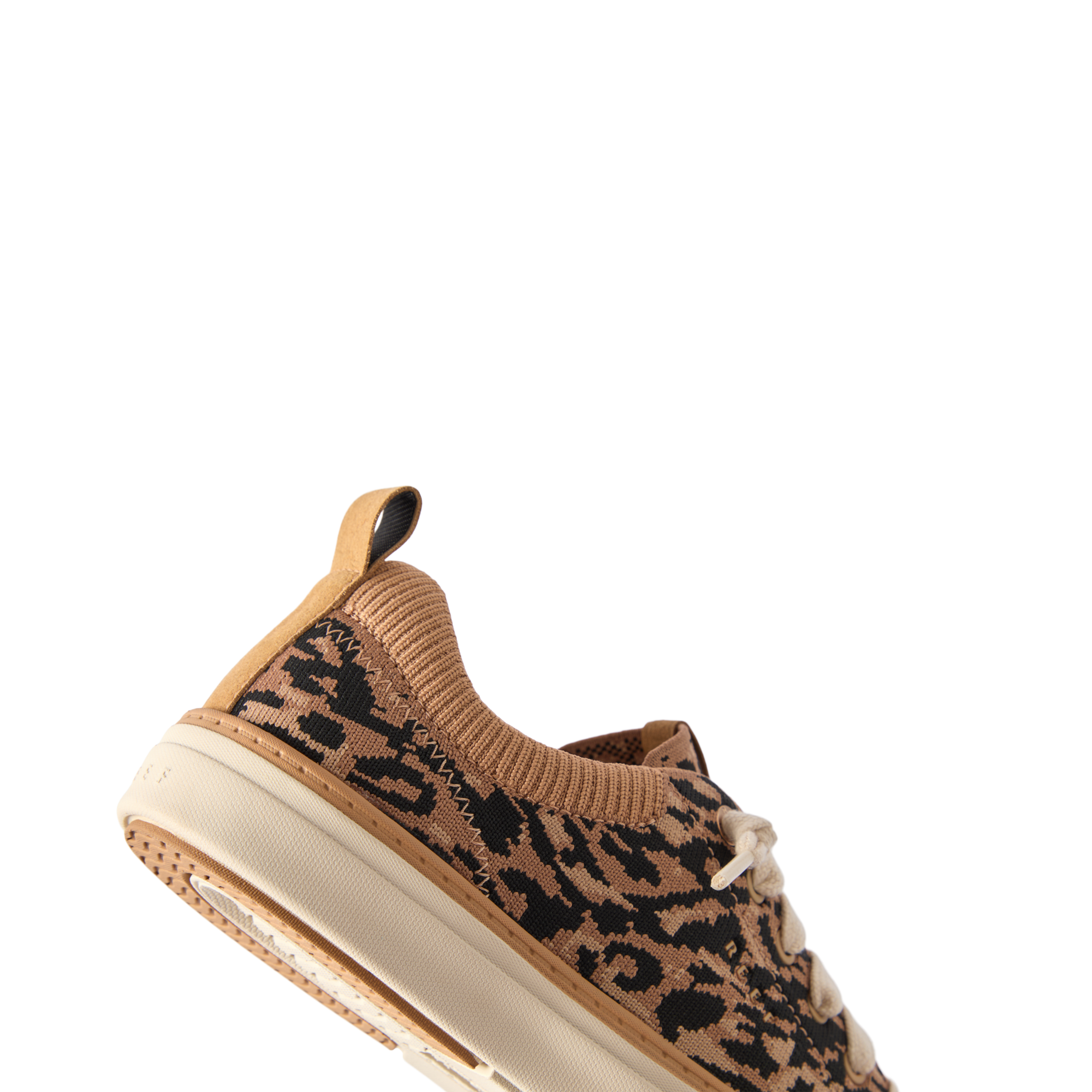 Lay Day Lite women's shoe facing left, close-up of knit upper with leopard pattern, showcasing cushioning and arch support design.