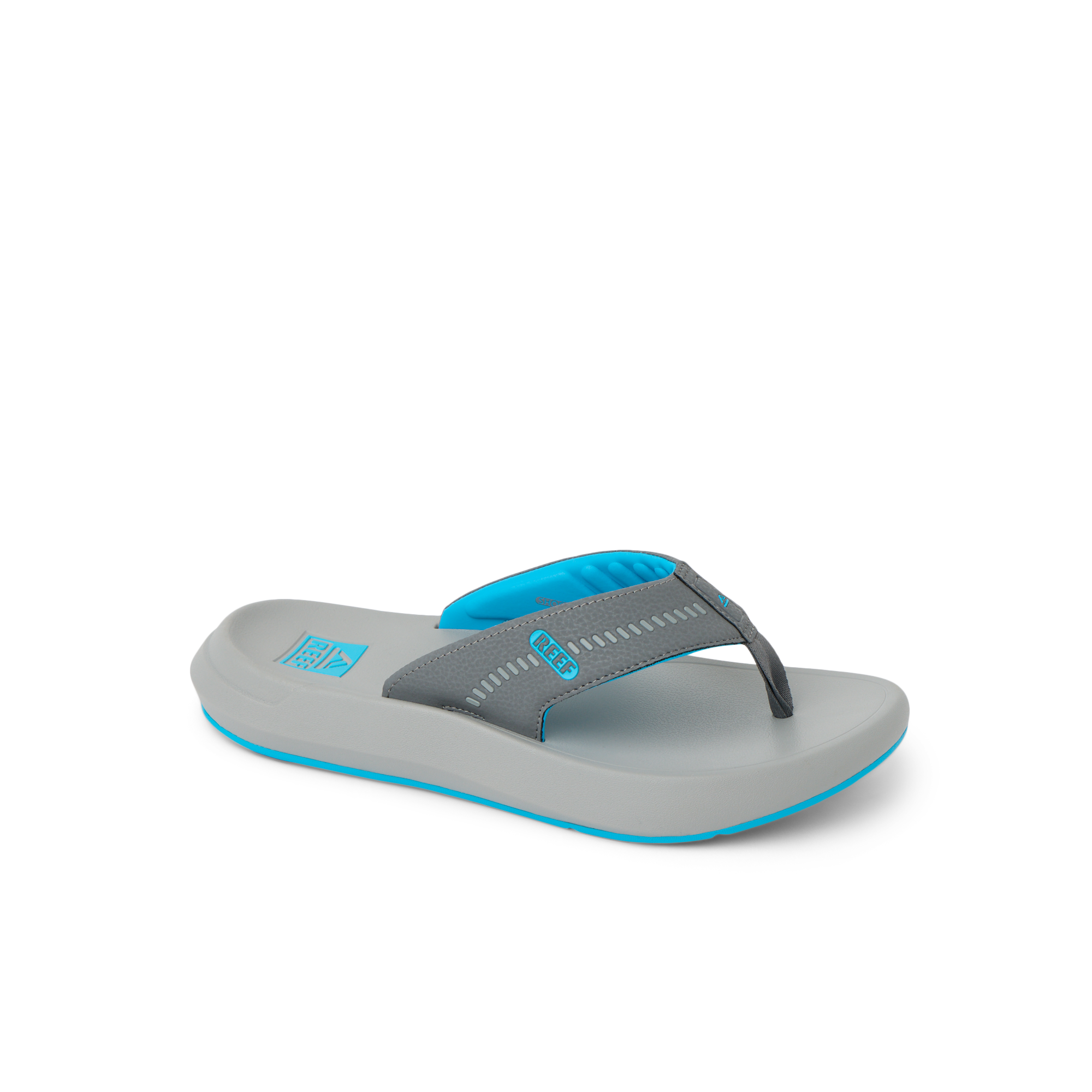 Cruiser sandal facing right, showing charcoal and aqua straps with cushioned footbed for all-day comfort.