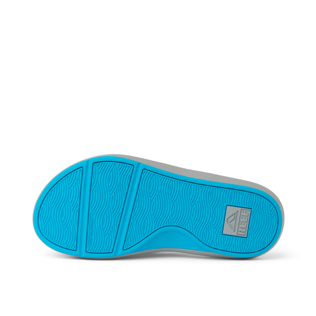 Cruiser footwear sole facing up showing aqua blue water-friendly outsole with anatomical arch support and durable design.