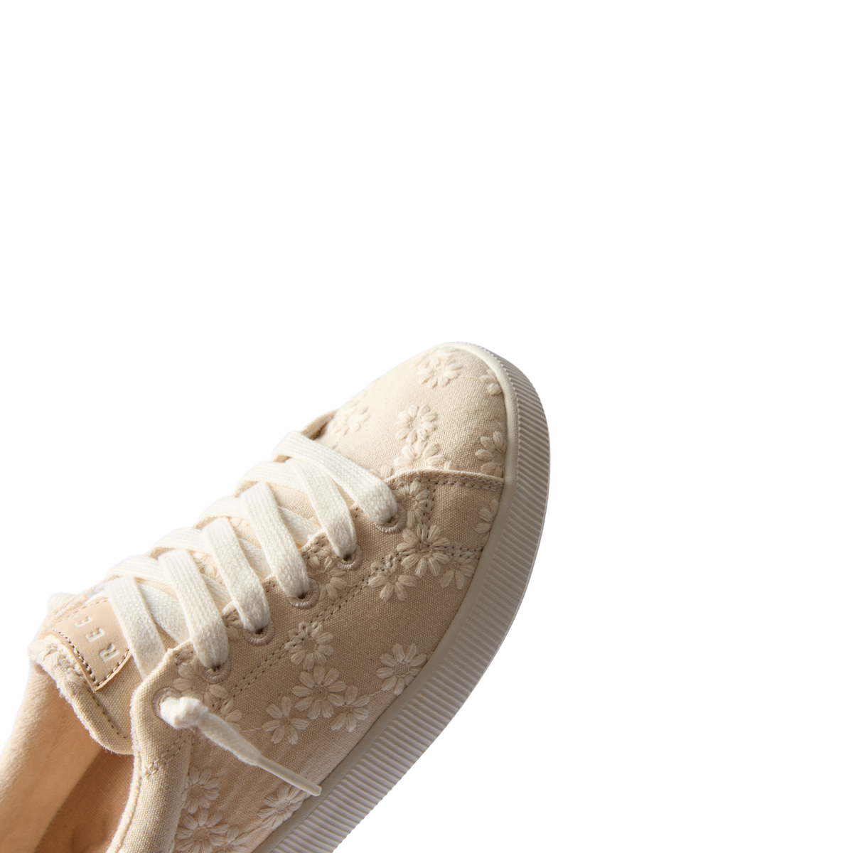 Close-up of Neptune Alana women's sneaker facing right with floral embroidery, extra cushioning, and arch support.