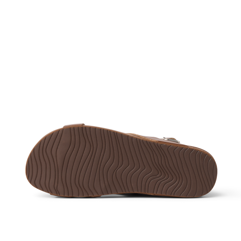 Vista Malia women's brown sandal sole facing up, showing durable tread with beach-inspired comfort design features.