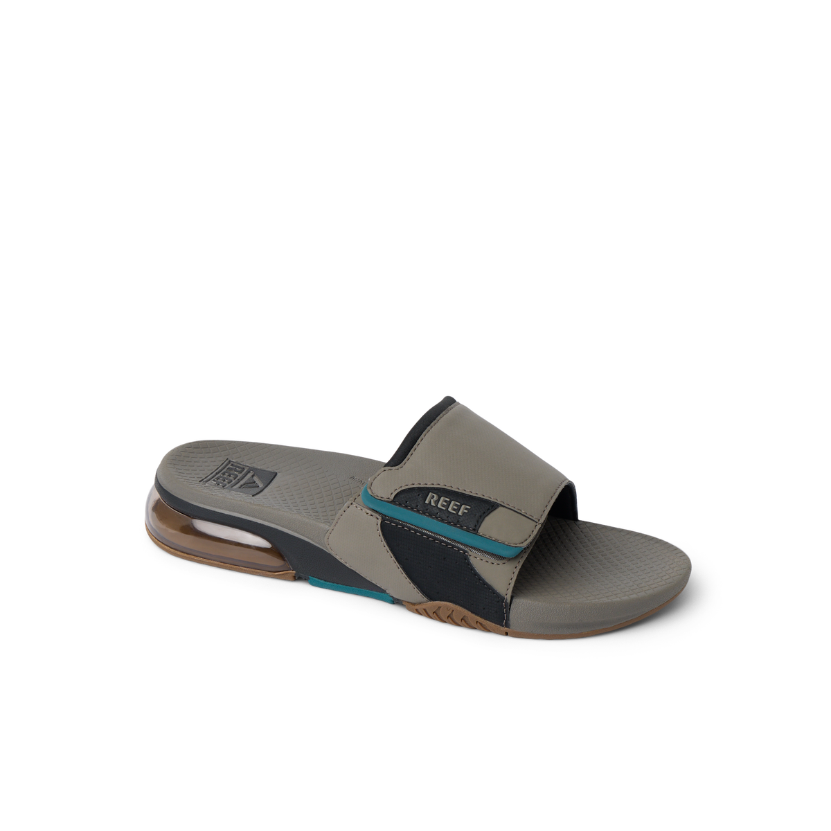 Fanning + Slide facing left, men's tan and spruce water-friendly sandal with oversized airbag heel and REEFlex cushioning