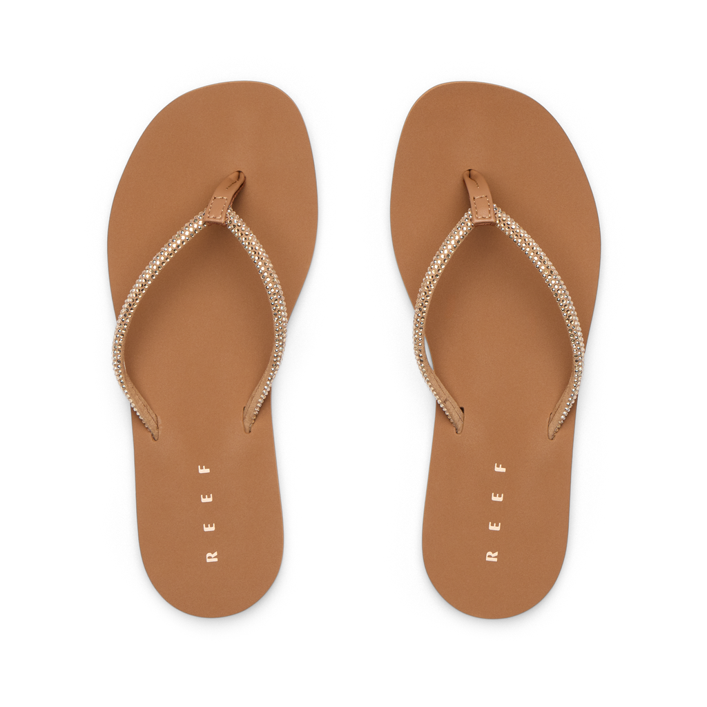 Top view of women's Bliss Bling Fling flip flops in suntan with cushioned footbeds and braided straps, beach inspired comfort.
