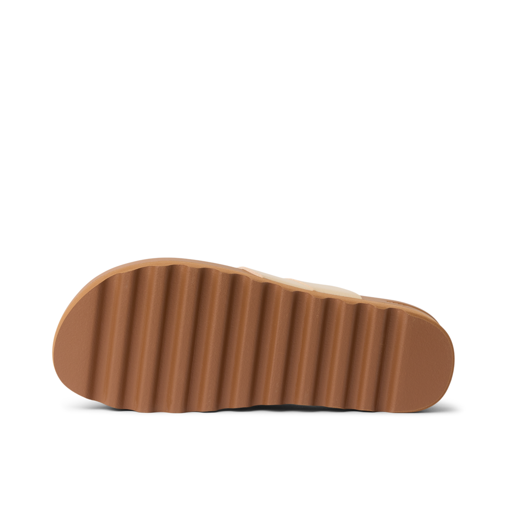 Vista Hi Layla women's shoe showing close-up of outsole with ridged tread, beach-inspired comfort and durability features.