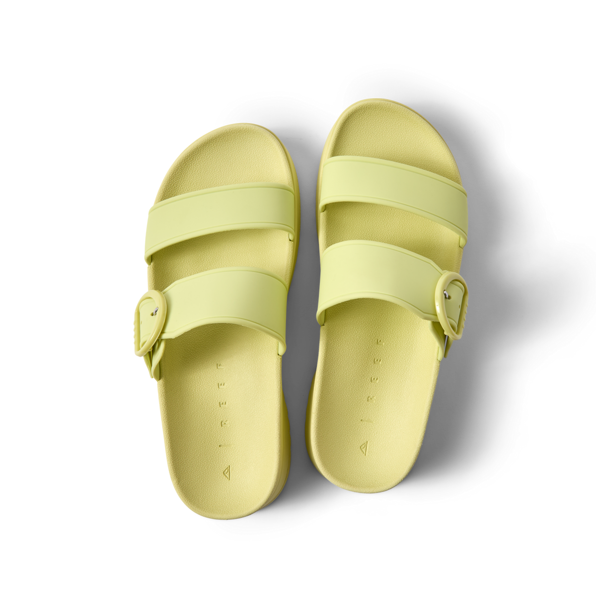 Top view of women's Vista Capri sandals in lime sherbet green with adjustable buckle straps, designed for comfort and beach wear.