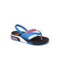 Little Fanning boys sandal facing right, close-up of toe post and blue, red, white beach-inspired design with arch support.