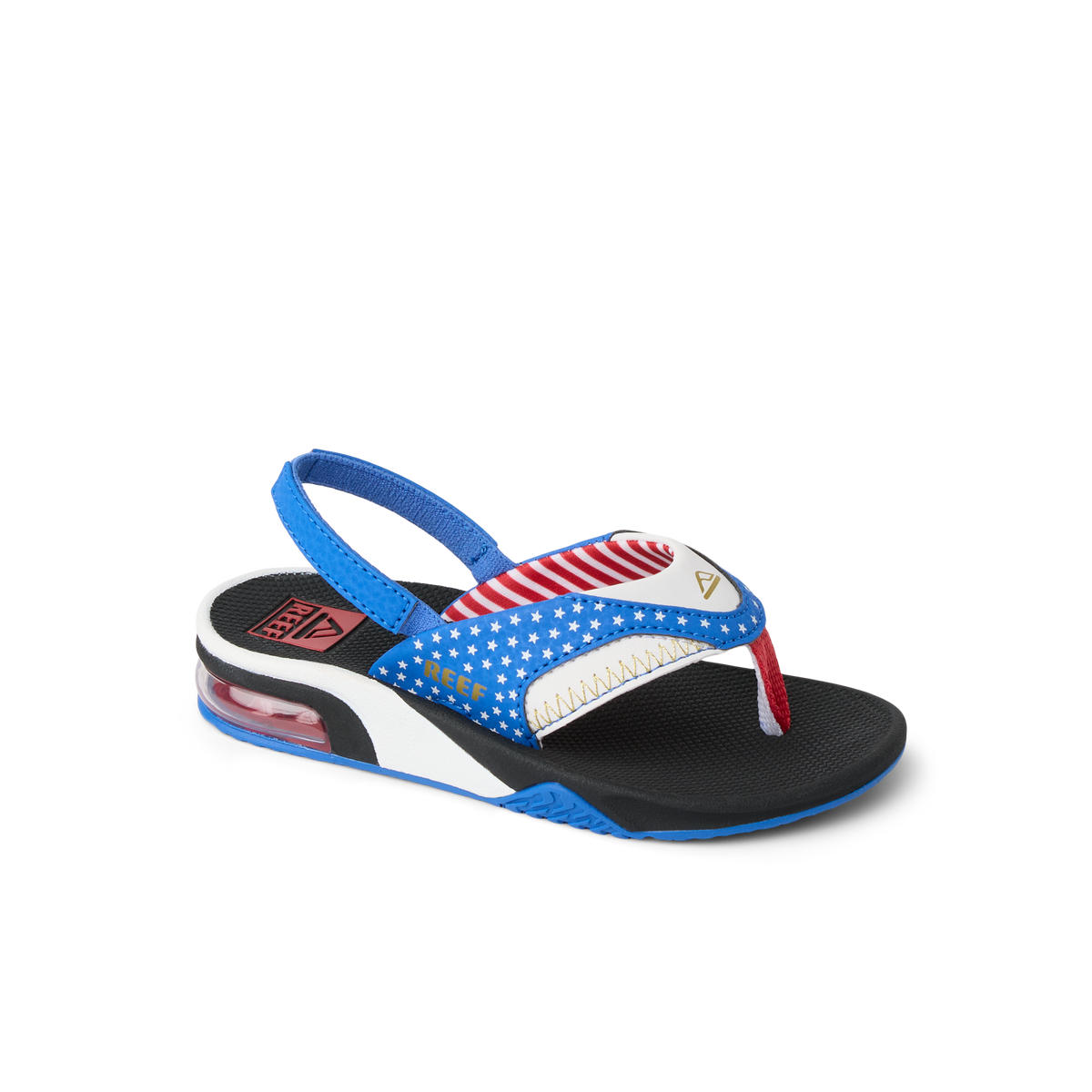 Little Fanning boys sandal facing right, close-up of toe post and blue, red, white beach-inspired design with arch support.