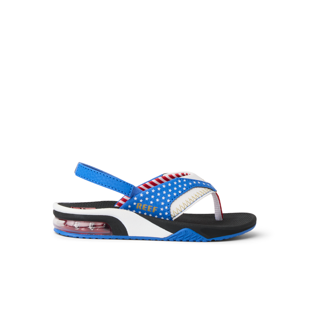 Little Fanning boys' sandal facing right with surf-inspired design, soft cushioning, and anatomical arch support.