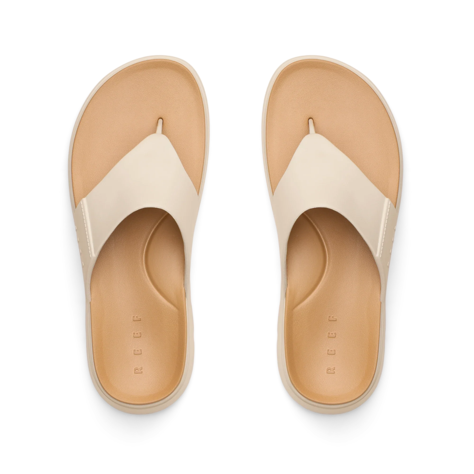 Top view of Cali Laguna white platform sandals facing upward, featuring extra cushioning and arch support, water-friendly design.