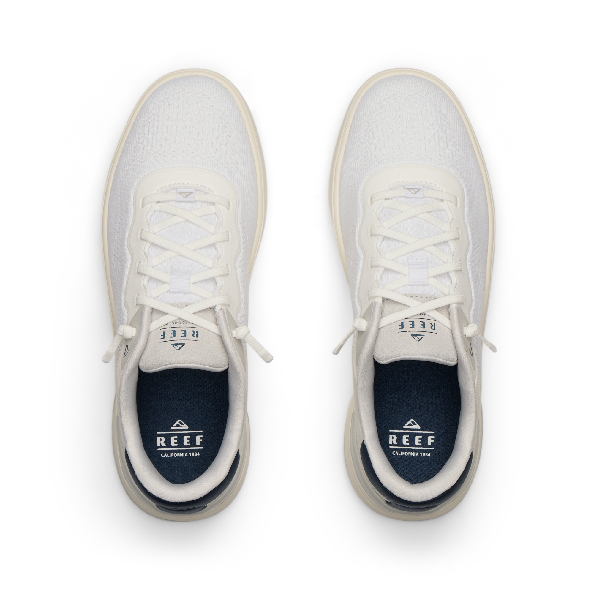Top view of Shoreline Del Mar men's shoes in white and grey with surf-inspired design, anatomical arch support, and soft cushioning.