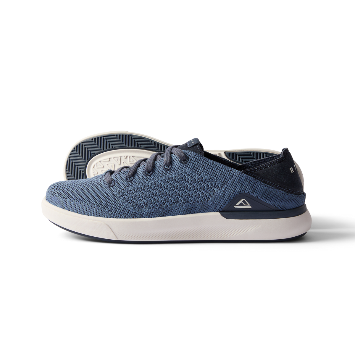 Neptune HT men's navy sneaker facing left showing side and sole, featuring extra cushion and REEF comfort technology.