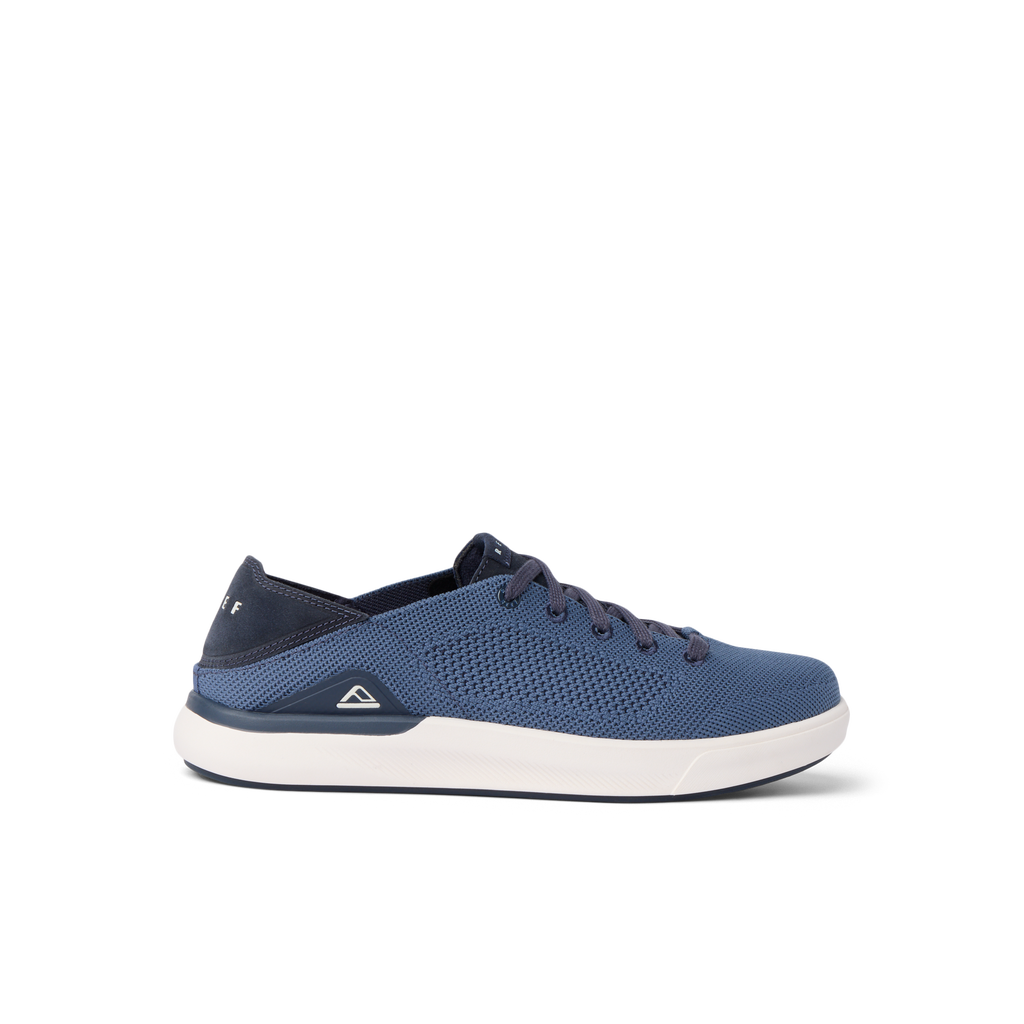 Neptune HT sneaker facing right, navy blue mesh with white sole, lightweight, water-friendly, extra cushioned for all-day comfort.