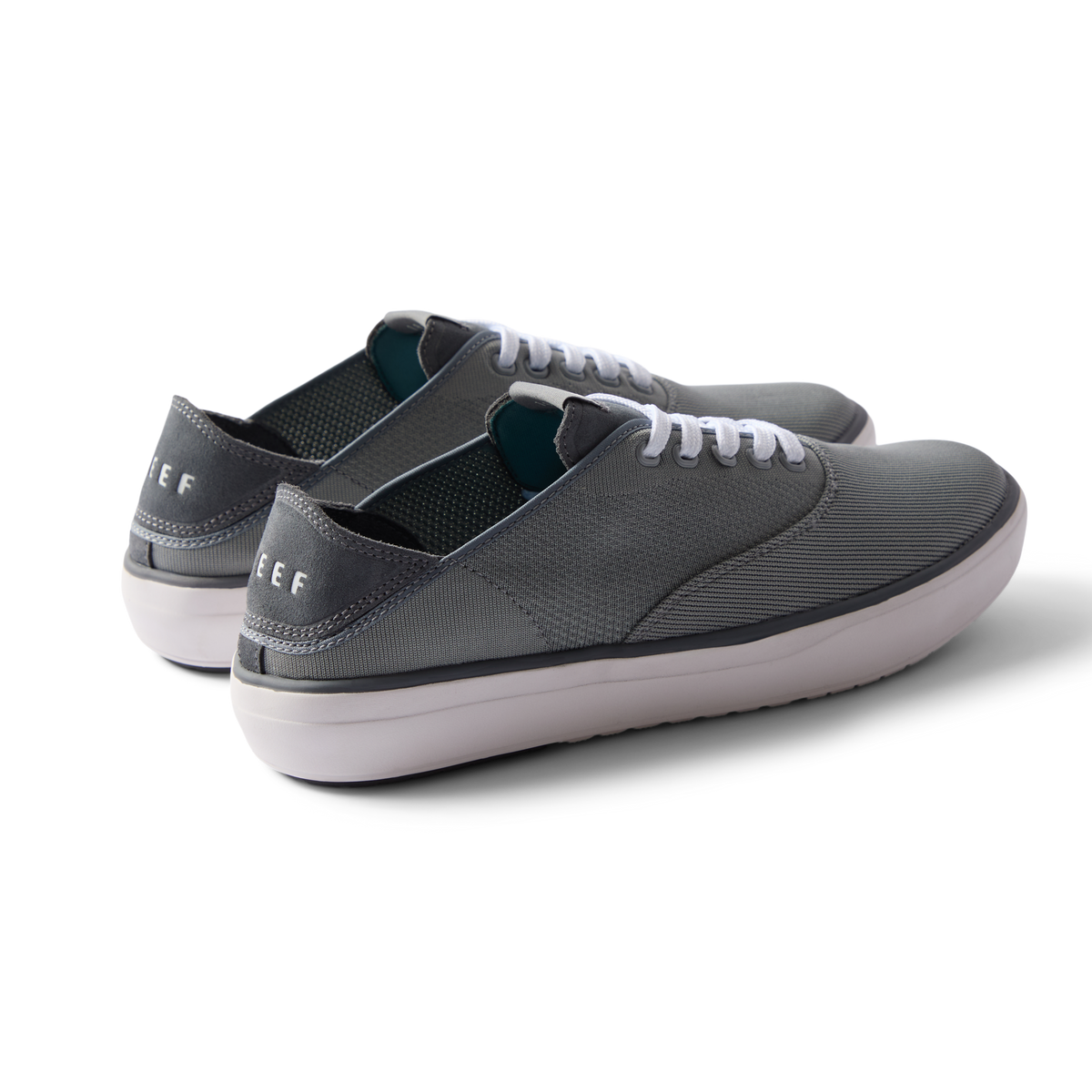 Pair of Neptune Lido men's grey sneakers facing right, showing rear and side with soft cushioning and arch support.