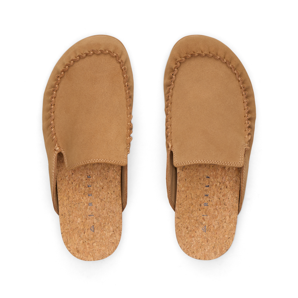 Pair of Vista Myra clogs facing up, women's tan suede slip-on shoes with stitched detail and cushioned cork footbed for all-day comfort